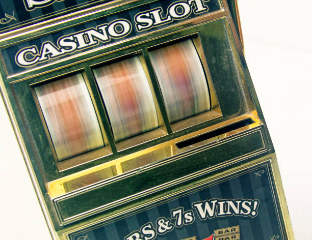 istock retro toy slot machine spinning 928765244