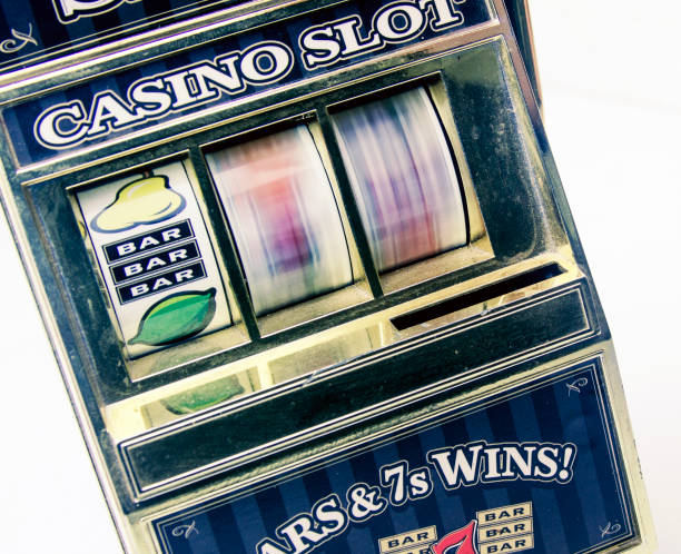 istock retro toy slot machine spinning 928765250