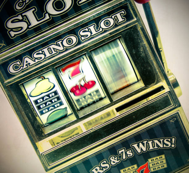 istock retro toy slot machine spinning 928765256
