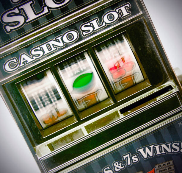 istock retro toy slot machine spinning 928765272