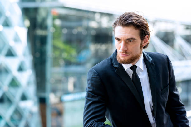 istock Confident young business man in black tie portrait. 928765486