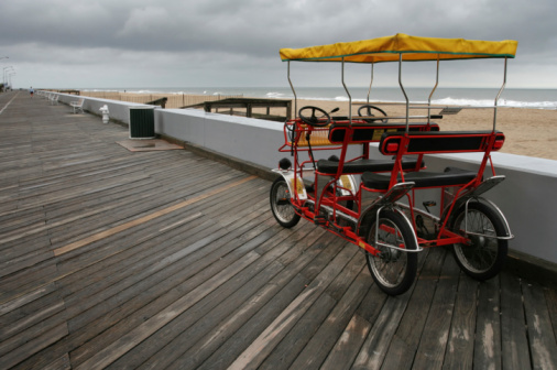 Derelict four-wheeled boardwalk bike.