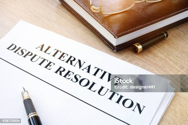 Documents With Title Alternative Dispute Resolution Adr In An Office Stock Photo - Download Image Now