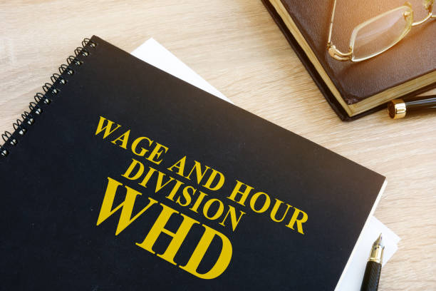 libro con el nombre de salario y hora division (whd). - division fotografías e imágenes de stock