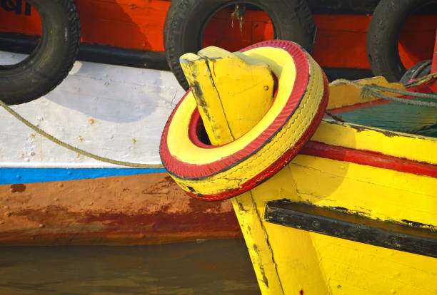 istock Colorful cruise boats at Mumbai waterfront 928775490