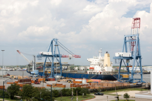 Bremerhaven, Bremen, 1965. Cargo ships unload their freight.