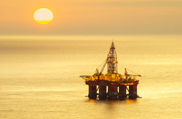 istock drilling platform on the sea at sunrise 928792050
