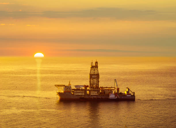 istock drilling platform on the sea at sunrise 928792076