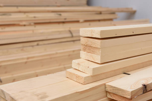 istock Many folded wooden planks in a warehouse 928792258