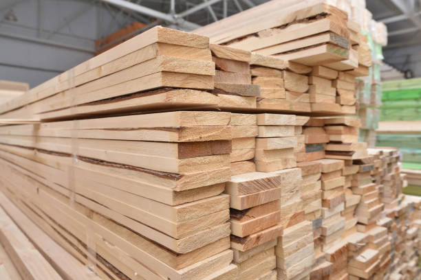 istock Many folded wooden planks in a warehouse 928794438