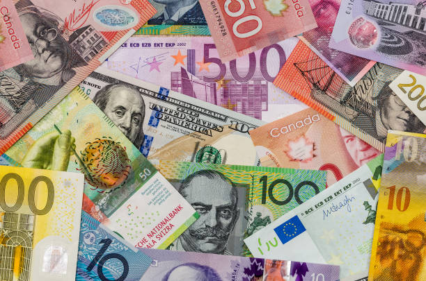 american dollars, european euro, swiss franc, canadian dollar, australian dollar  bills - swiss francs swiss currency switzerland finance imagens e fotografias de stock