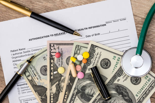 istock Health insurance form with stethoscope , pills and dollar 928796052