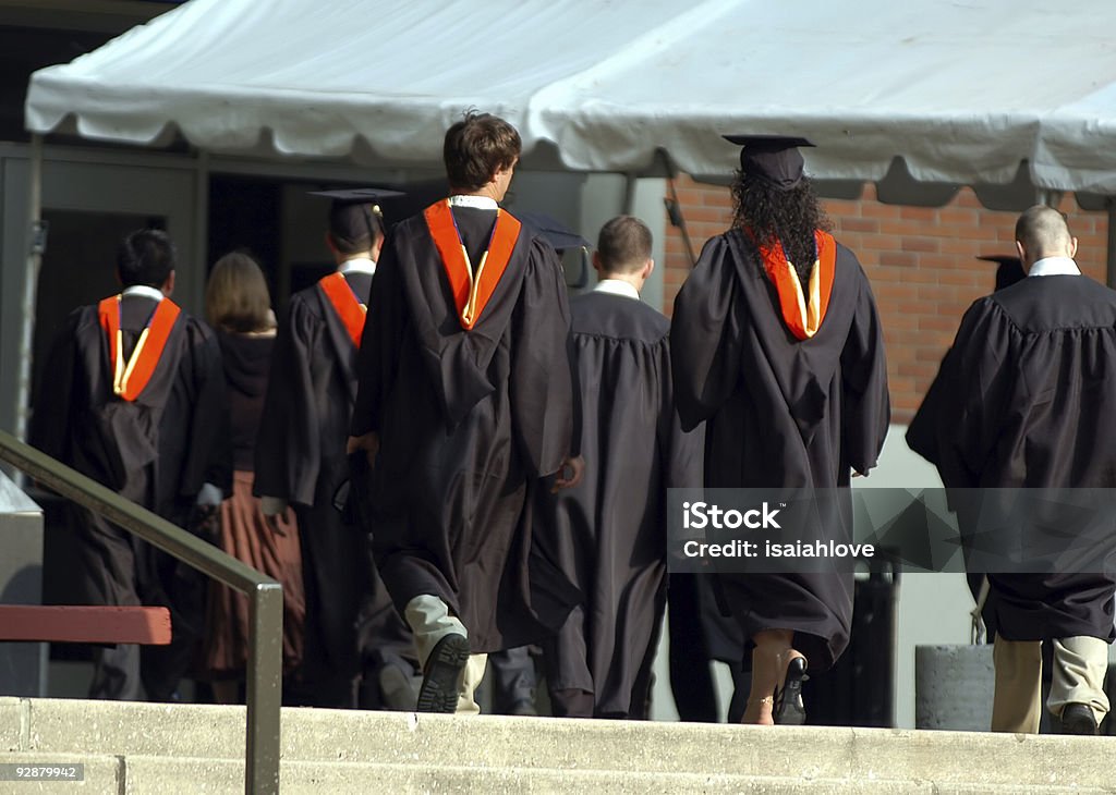 I diplomati - 1 - Foto stock royalty-free di Celebrazione della laurea