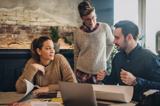 istock Young creative business people communicating on a meeting at office. 928807398