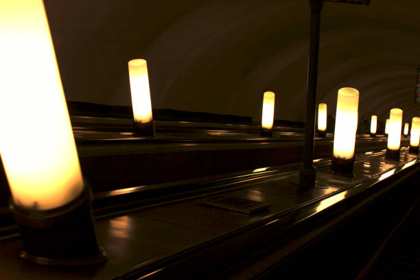istock light in the darkness and the descent on the escalator 928809134