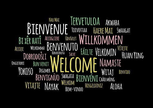 istock Welcome in different languages wordcloud vector on black background 928810368