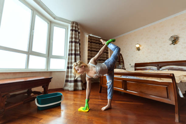 istock Young gymnast washes floors. 928810452