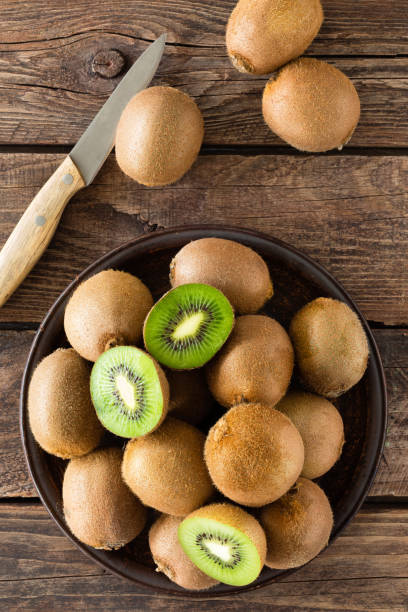 istock Kiwi fruit on wooden rustic table, ingredient for detox smoothie 928810850