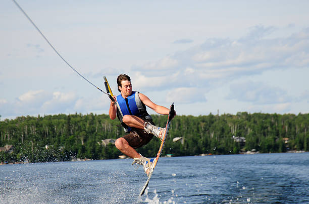 istock Young man jumps getting some big air on a nosegrab. 92881403