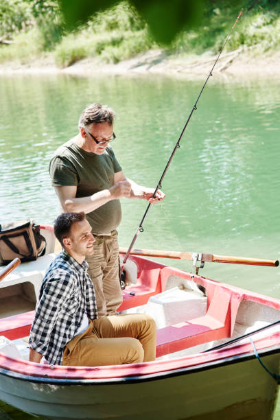 istock Men make preparations for fishing 928819224