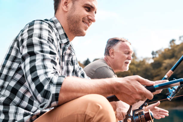 istock Close up of two men fly fising 928820172