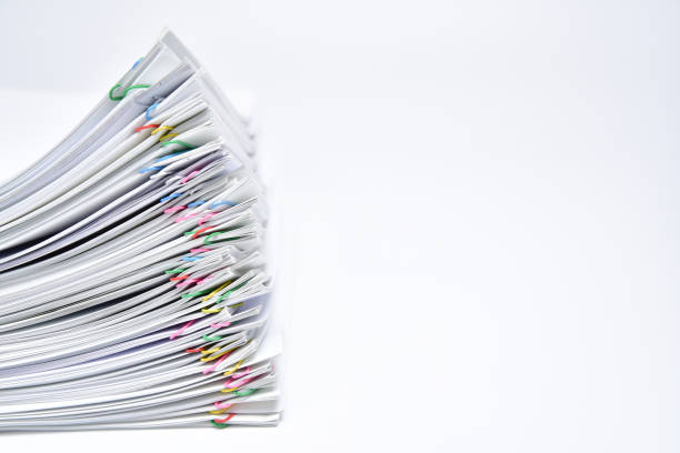 A pile of documents with copy space on white background. stock photo