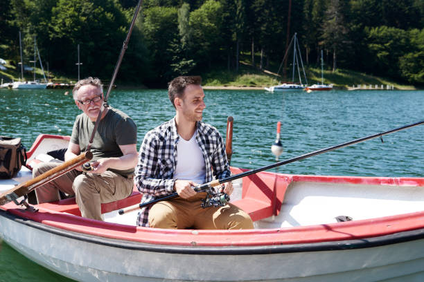 istock Men fishing in a lake 928827450