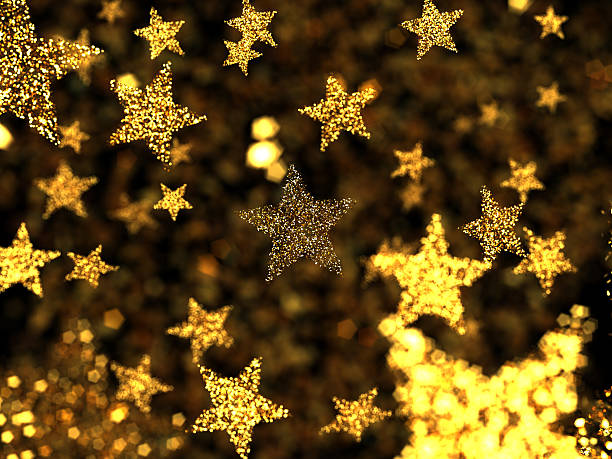 Gold stars with some out of focus stock photo