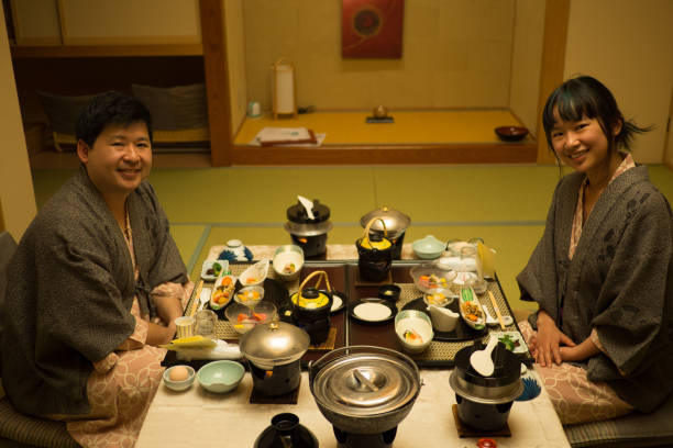 istock Two people enjoying a traditional Japanese dinner together also known as Kaiseki 928839928