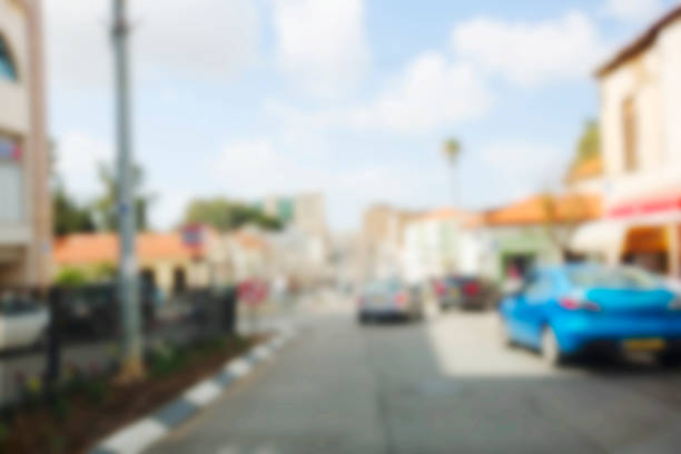 istock Abstract blurred background. Blurred road with car running 928845220