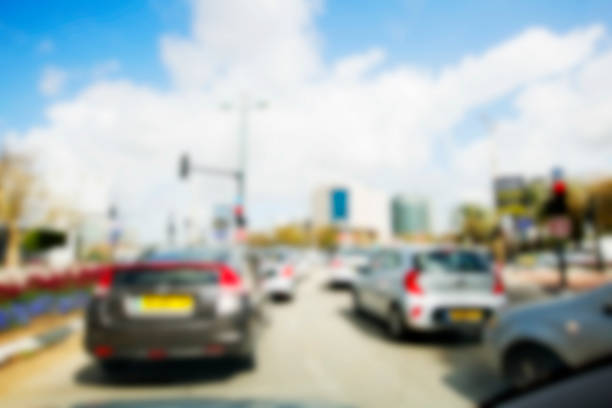 istock Abstract blurred background. Blurred road with car running 928845254