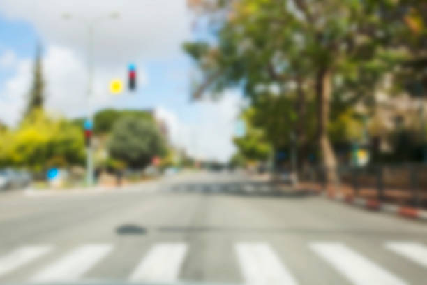 istock Abstract blurred background. Blurred road with car running 928847292
