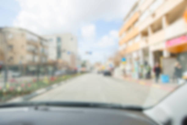 istock Abstract blurred background. Blurred road with car running 928848198