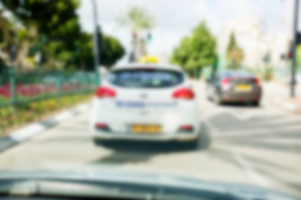 istock Abstract blurred background. Blurred road with car running 928849532