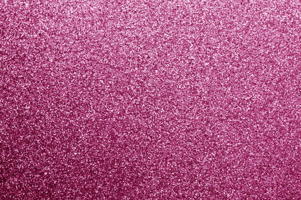 istock Glittering background in pink color. 928851644