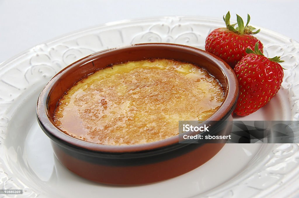 Creme Brulee Classic French Creme Brulee -- vanilla custard with a crunchy caramelized sugar topping. Caramel Stock Photo