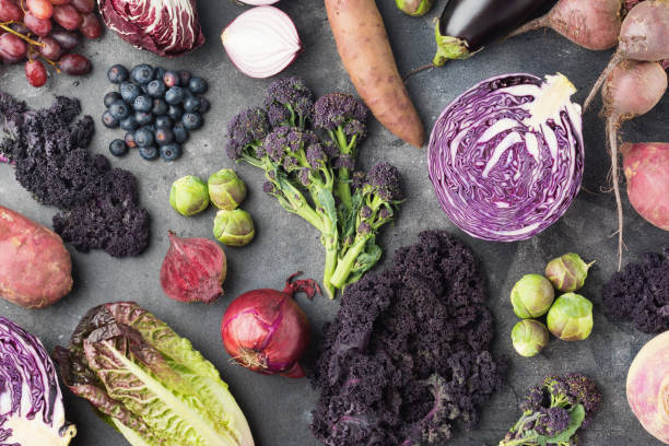 istock Vegetables background in purple, green and dark red 928855528