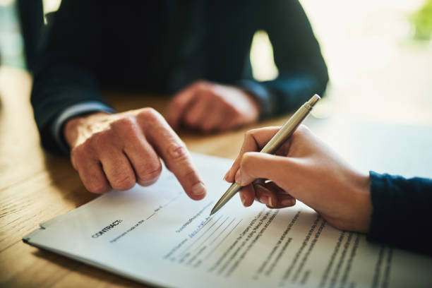 istock Always read the fine print before signing 928855650