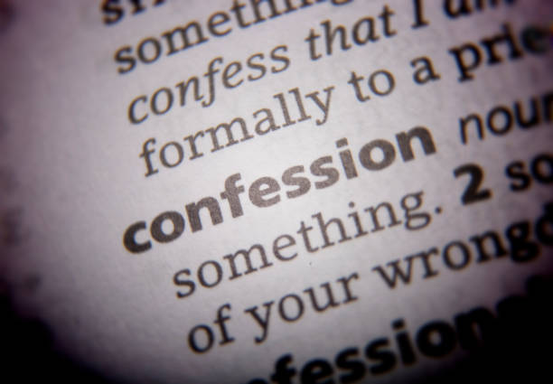 confession printed and defined in the english dictionary - confession booth imagens e fotografias de stock