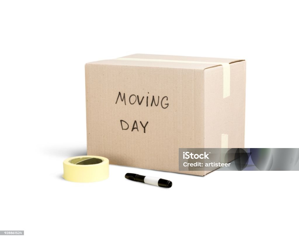 Box. Cardboard Box labelled moving day on background Relocation Stock Photo
