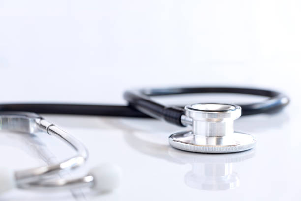 istock Stethoscope isolated on white table background. The stethoscope is a medical instrument for listening to the action of someone's heart or breathing. 928863648