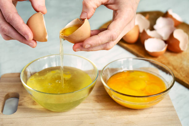 istock Separation of egg into protein and yolk 928866614