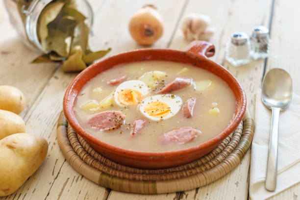 istock Traditional polish soup called Zurek nicely arranged with veggies and spices 928869466