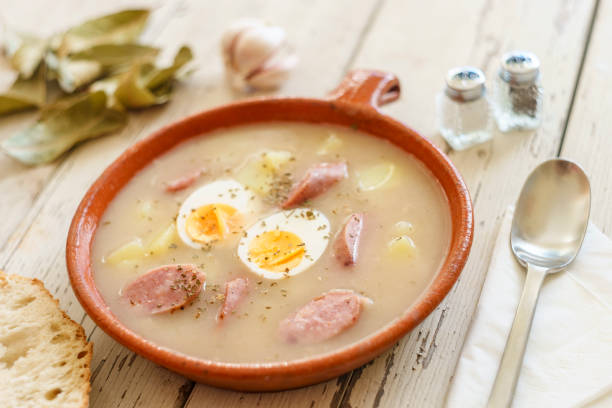 istock Traditional polish soup called Zurek served with bread 928869618