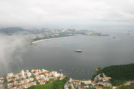 This photo showcases the awe-inspiring skyline of Rio de Janeiro, Brazil. The cityscape is a magnificent display of architectural and natural wonders. The photo captures the bustling metropolis with its vibrant streets, colorful buildings, and modern infrastructure, making it an ideal choice for travel brochures, websites, or any project that aims to highlight the beauty and wonder of this incredible city.