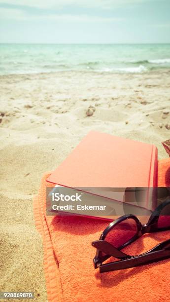 At The Beach Stock Photo - Download Image Now - Summer, Beach, Reading