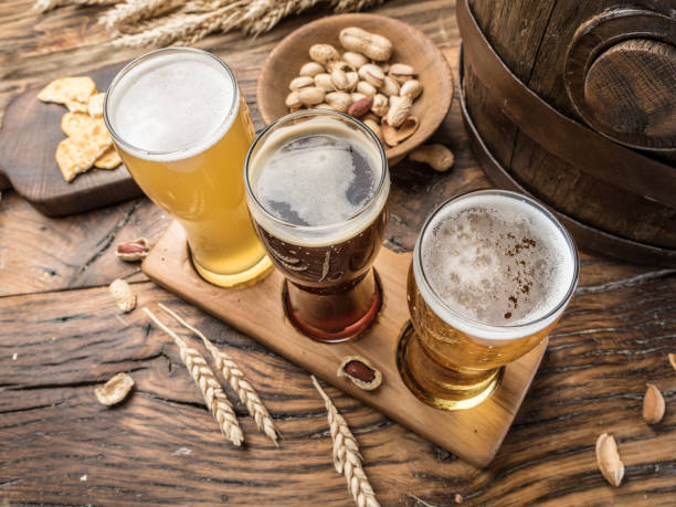 istock Glasses of beer and snacks. 928877148