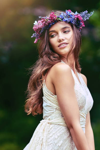 Its a beautiful thing to be happy in your skin Cropped shot of a beautiful young woman posing in nature floral crown photos stock pictures, royalty-free photos & images