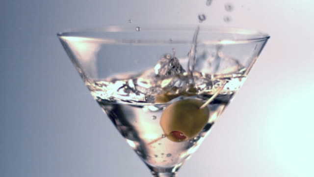 Slow motion olive splash