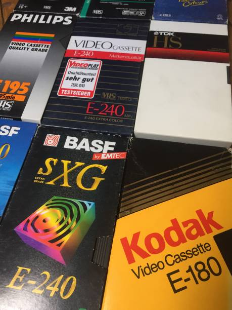 vhs video cassettes, many brands are recognizable - eastman kodak company imagens e fotografias de stock